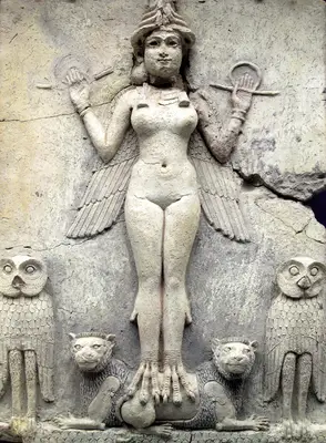 Photograph of an Ancient Babylonian figure dating from between 1792 and 1750 BC, perhaps a goddess. The figure stands on two doglike creatures.